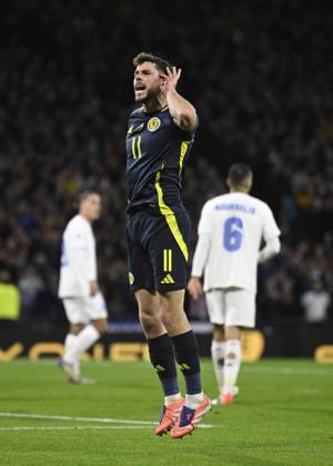 Glasgow, Scotland, 9th October 2025. Ryan Christie of Scotland scores the equaliser during the Scotland vs Greece FIFA World Cup, WM, Weltmeisterschaft, Fussball European Qualifying match at Hampden Park, Glasgow. Picture credit should read: Neil Hanna Sportimage EDITORIAL USE ONLY. No use with unauthorised audio, video, data, fixture lists, club league logos or live services. Online in-match use limited to 120 images, no video emulation. No use in betting, games or single club league player publications. SPI_056_NH_Scotland_Greece SPI-4206-0056