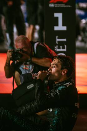 October 5, 2025, Singapore, Tamilnadu, Singapore: George Russell of Mercedes celebrates after the win at the F1 Grand Prix of Singapore at Marina Bay Street Circuit on October, 5th, 2025 in Singapore. Heâ€⠢s being photographer by the legendary Mark Sutton. Singapore Singapore - ZUMAc251 20251005_znp_c251_026 Copyright: xVikramxChandrasekarx