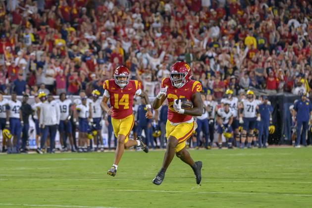 October 11, 2025, Los Angeles, California, USA: 21 Bryan Jackson, RB of the USC Trojans runs for a touchdoen during their BIG 10 football game against the Michigan Wolverines on Saturday October 11, 2025 at the Los Angeles Coliseum in Los Angeles, California. Trojans defeat Wolverines, 31-13. MARK HAMMOND BNS PI Los Angeles USA - ZUMAp124 20251011_zaa_p124_118 Copyright: xMarkxHammondx