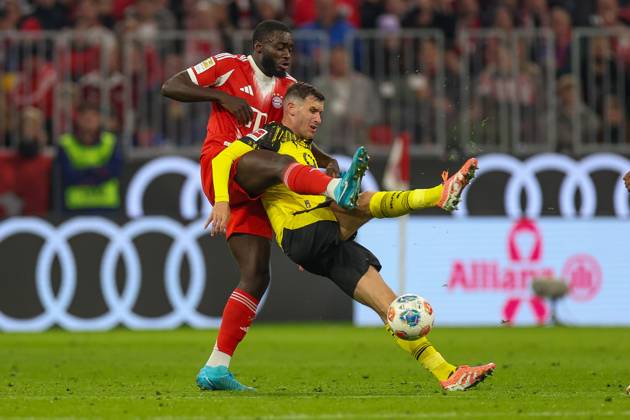 in duel, action, with Dayot Upamecano 2 FC Bayern Muenchen , Pascal Gross 13 Borussia Dortmund , FC Bayern Muenchen vs Borussia Dortmund, Football, 1 Bundesliga, 7 Matchday, 18 10 2025 DFB regulations prohibit any use of photographs as image sequences and or quasi video Muenchen Bayern Germany Copyright: xkolbert-press ChristianxKolbertx