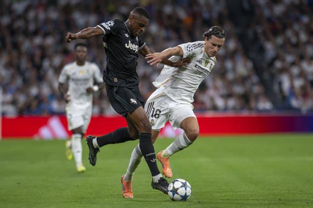 October 23, 2025, Madrid, Madrid, Spain: ALVARO CARRERAS of Real Madrid CF and PIERRE KALULU of Juventus de Turin in action during the match on the third day of the group stage of the 2025 26 UEFA Champions League between REAL MADRID C.F. vs JUVENTUS DE TURIN, played at the Santiago Bernabeu Stadium on October 22, 2025, in Madrid, Spain. Madrid Spain - ZUMAc312 20251023_zsp_c312_041 Copyright: xOscarxManuelxSanchezx