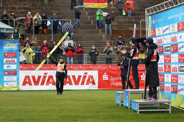 25 10 2025, Ski Jumping, Ladies, FIS Summer Grand Prix, Final Individual Competition Nozomi Maruyama JPN takes the days victory Nika Prevc SLO and Yuki Ito JPN Klingenthal Vogtland Arena Saxony Germany are already waiting on the podium