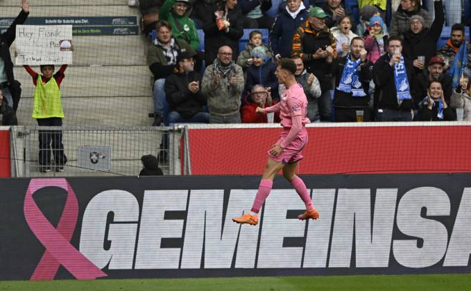 GOAL for 1 0 Fisnik Asllani TSG 1899 Hoffenheim 11 goal celebration Pink violet jersey special jersey campaign TOGETHER AGAINST BREAST CANCER TSG 1899 Hoffenheim in the background perimeter advertising logo TSG 1899 Hoffenheim vs 1 FC Heidenheim 1846 FCH 25 10 2025 DFL REGULATIONS PROHIBIT ANY USE OF PHOTOGRAPHS AS IMAGE SEQUENCES AND OR QUASI VIDEO TSG 1899 Hoffenheim vs 1 FC Heidenheim 1846 FCH