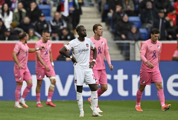 GOAL for 1 0 Fisnik Asllani TSG 1899 Hoffenheim 11 goal celebration Pink violet jersey special jersey campaign TOGETHER AGAINST BREAST CANCER TSG 1899 Hoffenheim in the background perimeter advertising logo front Omar Haktab Traore 1 FC Heidenheim 1846 FCH 23 disappointed TSG 1899 Hoffenheim vs 1 FC Heidenheim 1846 FCH 25 10 2025 DFL REGULATIONS PROHIBIT ANY USE OF PHOTOGRAPHS AS IMAGE SEQUENCES AND OR QUASI VIDEO TSG 1899 Hoffenheim vs 1 FC Heidenheim 1846 FCH