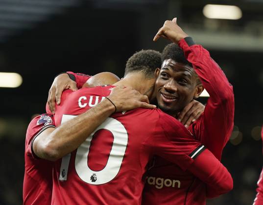 Manchester, England, 25th October 2025. Amad Diallo of Manchester United, ManU points to Matheus Cunha of Manchester United as he celebrates scoring the first goal during the Manchester United vs Brighton and Hove Albion Premier League match at Old Trafford, Manchester. Picture credit should read: Andrew Yates Sportimage EDITORIAL USE ONLY. No use with unauthorised audio, video, data, fixture lists, club league logos or live services. Online in-match use limited to 120 images, no video emulation. No use in betting, games or single club league player publications. SPI_040_AY_Man_Utd_Brighton SPI-4237-0039