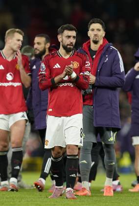 Manchester, England, 25th October 2025. Bruno Fernandes of Manchester United, ManU applauds the fans during the Manchester United vs Brighton and Hove Albion Premier League match at Old Trafford, Manchester. Picture credit should read: Andrew Yates Sportimage EDITORIAL USE ONLY. No use with unauthorised audio, video, data, fixture lists, club league logos or live services. Online in-match use limited to 120 images, no video emulation. No use in betting, games or single club league player publications. SPI_080_AY_Man_Utd_Brighton SPI-4237-0079