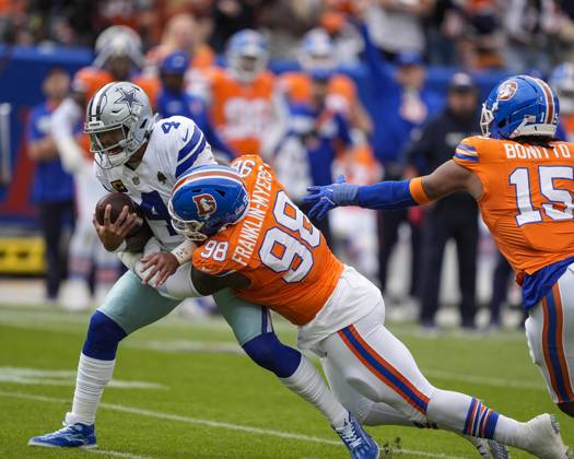 October 26, 2025: Dallas Cowboys quarterback Dak Prescott (4) is sacked by Denver Broncos defensive end John Franklin-Myers (98) win the first half of the football game between the Denver Broncos and Dallas Cowboys. CSM. - ZUMAc04_ 20251026_zma_c04_198 Copyright: xDerekxRegensburgerx