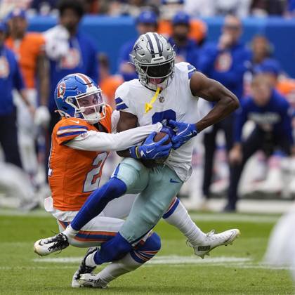October 26, 2025: Dallas Cowboys wide receiver George Pickens (3) is tackled by Denver Broncos cornerback Riley Moss (21) after making a reception in the first half of the football game between the Denver Broncos and Dallas Cowboys. CSM. - ZUMAc04_ 20251026_zma_c04_200 Copyright: xDerekxRegensburgerx