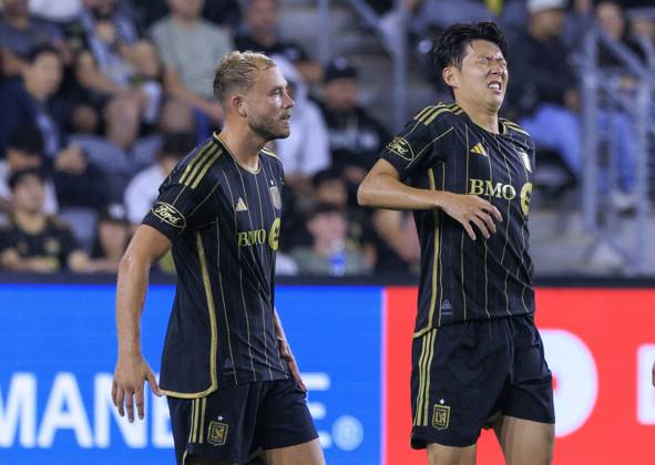 October 29, 2025, Los Angeles, California, USA: Son Heung-min 7 of the Los Angeles Football Club grimaces in pain after being fouled during Game1 of the Audi 2025 MLS, Fussball Herren, USA Cup Playoffs game against the Austin FC on Wednesday October 29, 2025 at the BMO Stadium in Los Angeles, California. LAFC defeats Austin FC, 2-1. JAVIER ROJAS PI Los Angeles USA - ZUMAp124 20251029_zaa_p124_086 Copyright: xJavierxRojasx