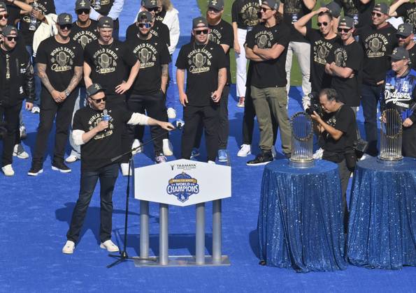Los Angeles Dodgers first baseman Freddie Freeman (L) celebrates their World Series win with teammates following a parade at Dodger Stadium in Los Angeles on Monday, November 3, 2025. LAP2025110314 JIMxRUYMEN