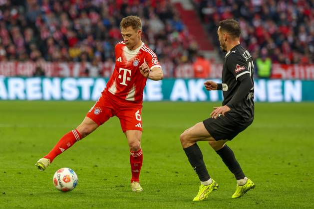 in duel, action, with Joshua Kimmich 6 FC Bayern Muenchen , Mathias Pereira situation 28 FC St Pauli , FC Bayern Muenchen vs FC St Pauli, Football, 1 Bundesliga, 12 Matchday, 29 11 2025 DFB regulations prohibit any use of photographs as image sequences and or quasi video Muenchen Bayern Germany Copyright: xkolbert-press ChristianxKolbertx