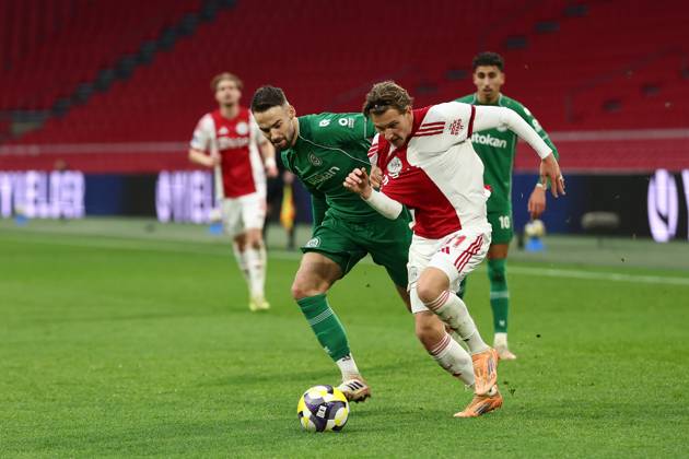 AMSTERDAM , 02-12-2025 , JohanCruyff Arena , season 2025 2026 , Dutch Eredivisie Football , match between Ajax and FC Groningen (replay) , Picture shows , FC Groningen player Marco Rente, .Ajax player Mika Godts Ajax - Groningen (replay) x32313332x Copyright:
