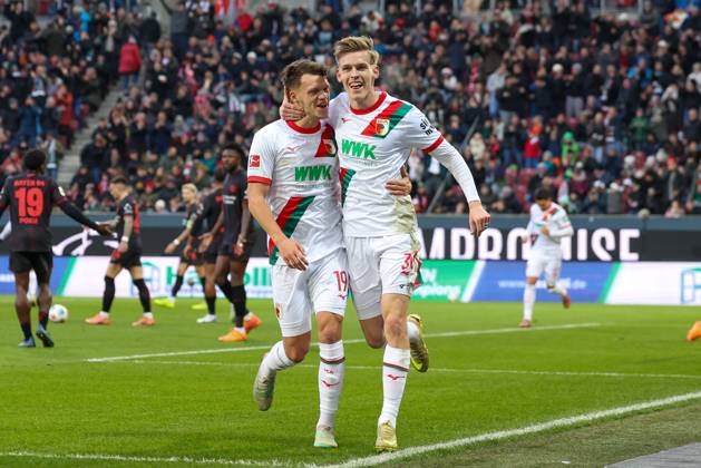 Goal celebration by Robin Fellhauer 19 FC Augsburg , Anton Kade 30 FC Augsburg to 2 0, FC Augsburg vs Bayer 04 Leverkusen, Soccer, 1 Bundesliga, 13 Matchday, 06 12 2025 DFB regulations prohibit any use of photographs as image sequences and or quasi video Augsburg Bayern Germany Copyright: xkolbert-press ChristianxKolbertx
