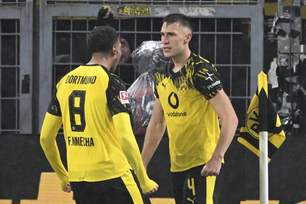 Nico Schlotterbeck Dortmund 4 celebrates after scoring the 2-0 goal with Felix Nmecha Dortmund 8 07 12 2025 Football Borussia Dortmund vs TSG Hoffenheim, Signal Iduna Park, Dortmund, DFB DFL REGULATIONS PROHIBIT ANY USE OF PHOTOGRAPHS AS IMAGE SEQUENCES AND OR QUASI VIDEO Copyright: xpepphotox xHorstxMauelshagenx pep00321, pep_20251207_hm_230321