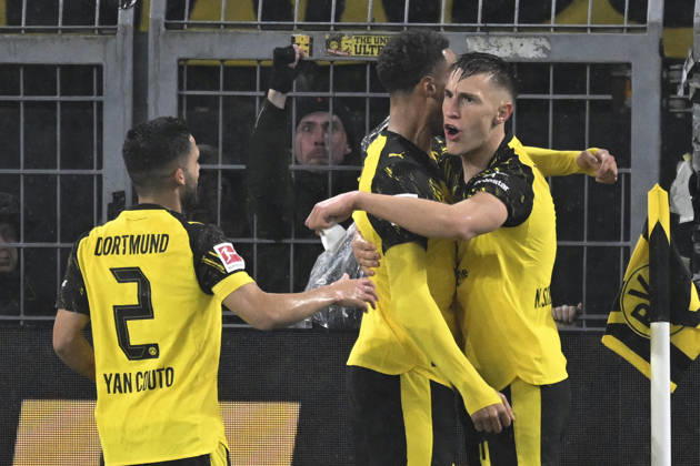 Nico Schlotterbeck Dortmund 4 celebrates after scoring 2 0 with Felix Nmecha Dortmund 8 Yan Couto Dortmund 2 07 12 2025 Football Borussia Dortmund vs TSG Hoffenheim, Signal Iduna Park, Dortmund, DFB DFL REGULATIONS PROHIBIT ANY USE OF PHOTOGRAPHS AS IMAGE SEQUENCES AND OR QUASI VIDEO Copyright: xpepphotox xHorstxMauelshagenx pep00321, pep_20251207_hm_230329