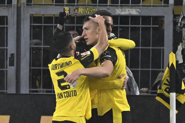 Nico Schlotterbeck Dortmund 4 celebrates after scoring 2 0 with Felix Nmecha Dortmund 8 Yan Couto Dortmund 2 07 12 2025 Football Borussia Dortmund vs TSG Hoffenheim, Signal Iduna Park, Dortmund, DFB DFL REGULATIONS PROHIBIT ANY USE OF PHOTOGRAPHS AS IMAGE SEQUENCES AND OR QUASI VIDEO Copyright: xpepphotox xHorstxMauelshagenx pep00321, pep_20251207_hm_230334