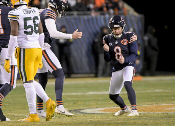 Chicago Bears place kicker Cairo Santos (8) celebrates his fourth quarter field goal against the Green Bay Packers at Soldier Field in Chicago on Saturday, December 20, 2025. Bears defeated the Packers 22-16.  CHI20251220127 MARKxBLACK