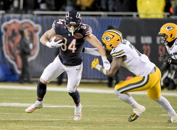 Chicago Bears tight end Colston Loveland (84) fends off Green Bay Packers linebacker Quay Walker (7) during the fourth quarter at Soldier Field in Chicago on Saturday, December 20, 2025. Bears defeated the Packers 22-16. CHI20251220130 MARKxBLACK