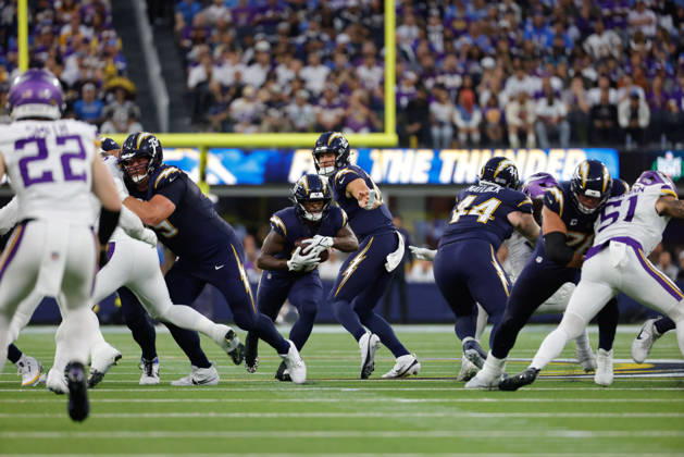 INGLEWOOD, CA - OCTOBER 23: Los Angeles Chargers running back Kimani Vidal (30) finds a hole to run through during the NFL, American Football Herren, USA game between the Minnesota Vikings and the Los Angeles Chargers on October 23, 2025, at SoFi Stadium in Inglewood, CA. (Photo by Jevone Moore Icon Sportswire) NFL: OCT 23 Vikings at Chargers EDITORIAL USE ONLY Icon20251023053