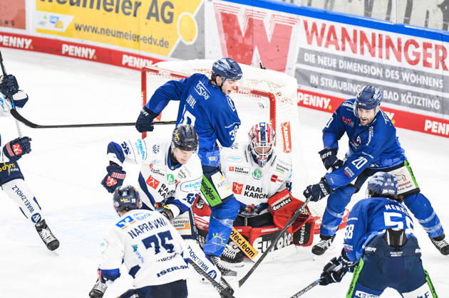 Straubing Tigers vs Iserlohn Roosters, Ice Hockey, German Ice Hockey League, Penny DEL, 33 Matchday, Season 2025 2026, 28 12 2025 Justin Scott and Stefan Loibl Straubing Tigers fighting for the puck, Ice Hockey Men, German Ice Hockey League, Penny DEL, 33 Matchday, Season 2025 2026 on 28 12 2025 at Eisstadion am Pulverturm, Straubing Tigers blue vs Iserlohn Roosters white