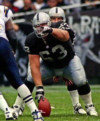 November 14, 1999 - Oakland, California, U.S - Oakland Raiders vs. San Diego Chargers at Oakland Alameda County Coliseum Sunday, November 14, 1999. Raiders beat Chargers 28-9. Oakland Raiders center Barret Robbins (63) and quarterback Rich Gannon Copyright: xAlxGolubx