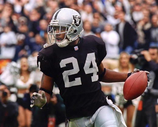 November 28, 1999 - Oakland, California, U.S - Oakland Raiders vs. Kansas City Chiefs at Oakland Alameda County Coliseum Sunday, November 29, 1999. Chiefs beat Raiders 37-34. Oakland Raiders defensive back Charles Woodson (24) recovers ball. Copyright: xAlxGolubx