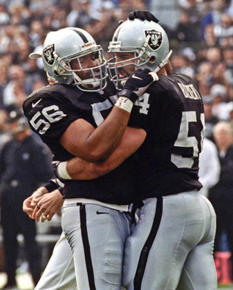 November 28, 1999 - Oakland, California, U.S - Oakland Raiders vs. Kansas City Chiefs at Oakland Alameda County Coliseum Sunday, November 29, 1999. Chiefs beat Raiders 37-34. Oakland Raiders linebacker Sam Sword (56) and linebacker Greg Biekert Copyright: xAlxGolubx