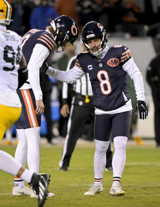 Chicago Bears place kicker Cairo Santos (8) celebrates his third quarter field goal against the Green Bay Packers during an NFL, American Football Herren, USA wild-card playoff football game at Soldier Field in Chicago on Saturday, January 10, 2026. The Bears defeated the Packers 31-27 and advance to the division finals next week.  CHI20260110201 MARKxBLACK