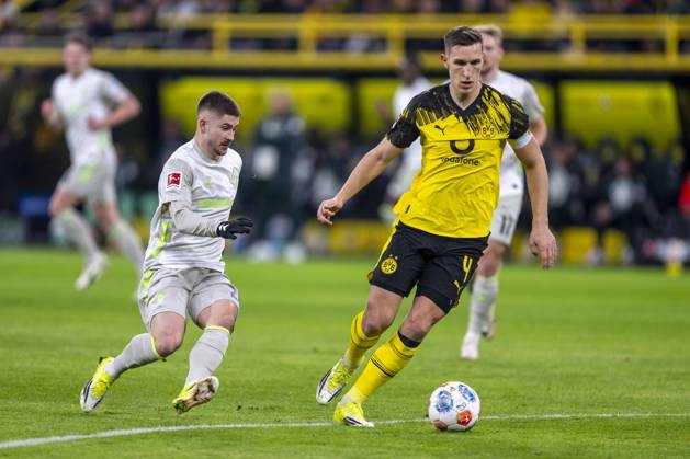 13 01 2026 Football Borussia Dortmund SV Werder Bremen, Matchday 17 at Signal Iduna Park Romano Schmid Werder Bremen l and Nico Schlotterbeck Borussia Dortmund fight for the ball IMPORTANT NOTE In accordance with the regulations of the DFL and the DFB, it is prohibited to use or have used photographs taken in the stadium and or of the match in the form of sequential images and or video-like photo series Copyright: xDavidxInderliedx