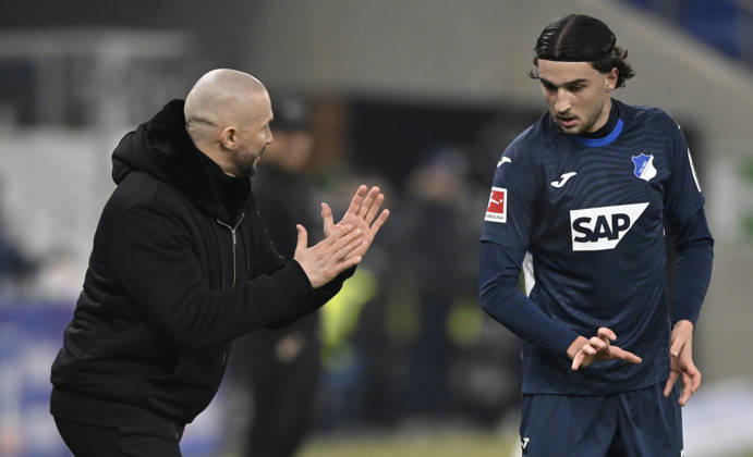 Coach Christian Ilzer TSG 1899 Hoffenheim on the sidelines in discussion with Leon Avdullahu TSG 1899 Hoffenheim 07 TSG 1899 Hoffenheim vs Borussia Moenchengladbach BMG 14 01 2026 DFL REGULATIONS PROHIBIT ANY USE OF PHOTOGRAPHS AS IMAGE SEQUENCES AND OR QUASI VIDEO TSG 1899 Hoffenheim vs Borussia Moenchengladbach BMG Sinsheim Copyright: xEibner-Pressefotox EP_MWI