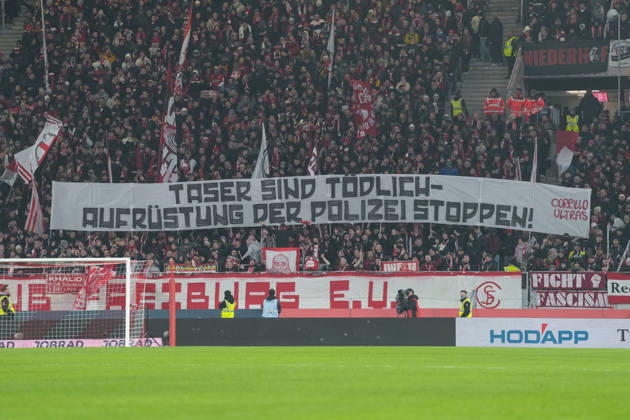 Banner of the fans and Ultras in the stands, banner, Taser, police armament , Germany, Football, 1 Bundesliga, 19 Matchday, 2025 2026, SC Freiburg vs 1 FC Köln, 25 01 2026, Europa Park Stadion, Freiburg, Germany DFL REGULATIONS PROHIBIT ANY USE OF PHOTOGRAPHS AS IMAGE SEQUENCES AND OR QUASI VIDEO Freiburg Europa Park Stadion Baden Württemberg Germany Copyright: xArnexAmbergx