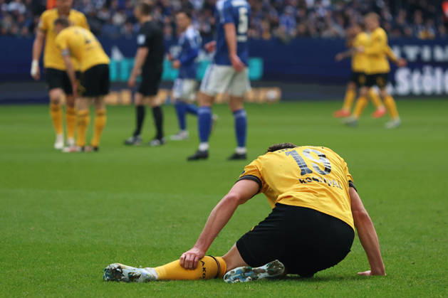 Alexander Rossipal SG Dynamo Dresden lies on the ground during the match of the 2 Bundesliga season 2025 26 FC Schalke 04 Dynamo Dresden Copyright Thomas Pakusch Copyright: Thomas Pakusch