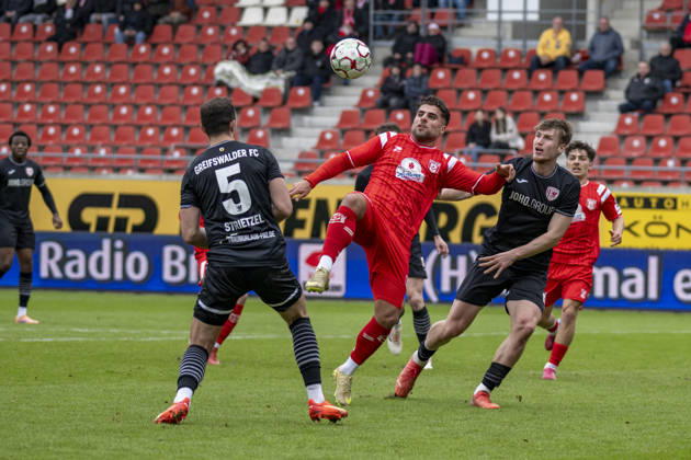 Regionalliga Nordost Season 25 26 Hallescher FC vs Greifswalder FC Halle, Germany February 21, 2026 In the picture from left in duel Bastian Strietzel Greifswald and Malek Fakhro Halle Halle Saale Leuna Chemie Stadion Sachsen Anhalt Germany