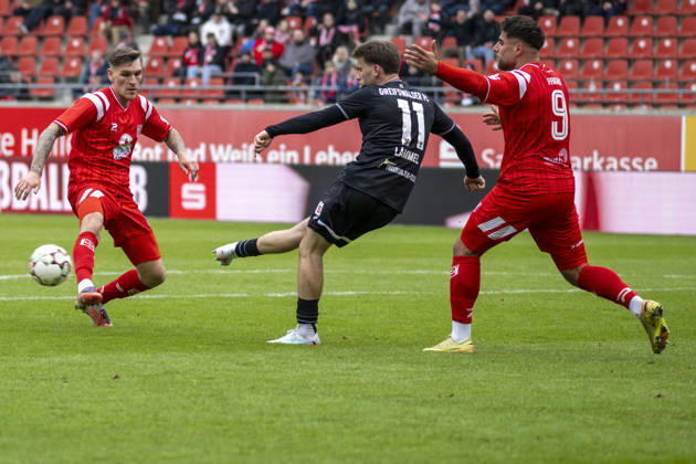 Regionalliga Nordost Season 25 26 Hallescher FC vs Greifswalder FC Halle, Germany February 21, 2026 Pictured from left Niclas , Lukas Lämmel Laemmel Greifswald and Malek Fakhro Halle Stierlin Halle Halle Saale Leuna Chemie Stadion Sachsen Anhalt Germany