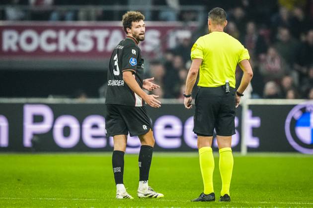 AMSTERDAM , 21-02-2026 , JohanCruyff Arena , season 2025 2026 , Dutch Eredivisie football , match between Ajax and NEC Nijmegen , picture shows NEC player Philippe Sandler and referee Jeroen Manschot Ajax - NEC x201794408x Copyright: