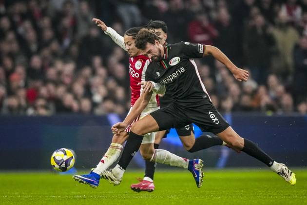 AMSTERDAM , 21-02-2026 , JohanCruyff Arena , season 2025 2026 , Dutch Eredivisie football , match between Ajax and NEC Nijmegen , picture shows Ajax player Kian Fitz-Jim and NEC player Philippe Sandler Ajax - NEC x201794429x Copyright: