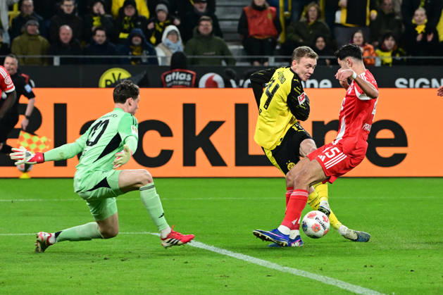 Maximilian Beier 14 Borussia Dortmund in duel with Alexandar Pavlovic 45 FC Bayern Muenchen , Borussia Dortmund vs FC Bayern Muenchen, Soccer, 1 Bundesliga, 24 Matchday, 28 02 2026 DFB regulations prohibit any use of photographs as image sequences and or quasi video Dortmund Nordrhein Westfalen Germany Copyright: xkolbert-press MarcxNiemeyerx
