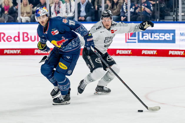 Fight for the puck duel between Markus Eisenschmid EHC Red Bull Muenchen, 11 and Juhani Tyrvaeinen Koelner Haie, 21 GER, EHC Red Bull Muenchen vs Koelner Haie, Ice Hockey, DEL, Matchday 47, Season 2025 2026, 01 03 2026 GER, EHC Red Bull Muenchen vs Koelner Haie, Ice Hockey, DEL, Matchday 47, Season 2025 2026, 01 03 2026 Muenchen Copyright: xEibner-Pressefoto HeikexFeinerx EP_HFR