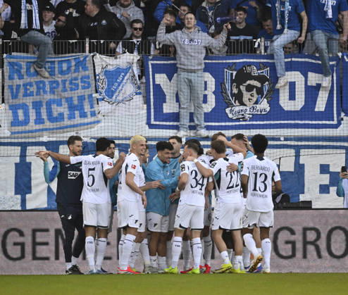 GOAL for 0 3 Fisnik Asllani TSG 1899 Hoffenheim 11 Goal celebration banner, protest, protest poster, fan poster, banner, poster, banner player advisor ROGON VERPISS DICH 1 FC Heidenheim 1846 FCH vs TSG 1899 Hoffenheim 07 03 2026 DFL REGULATIONS PROHIBIT ANY USE OF PHOTOGRAPHS AS IMAGE SEQUENCES AND OR QUASI VIDEO 1 FC Heidenheim 1846 FCH vs TSG 1899 Hoffenheim