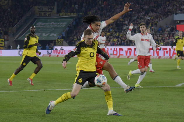 from left in duel Maximilian Beier Dortmund 14 Jahmai Simpson Pusey Koeln 22 07 03 2026¢ Football ¢ 1 FC Koeln vs Borussia Dortmund , Rheinenergiestadion, Koeln, DFB DFL REGULATIONS PROHIBIT ANY USE OF PHOTOGRAPHS AS IMAGE SEQUENCES AND OR QUASI VIDEO Copyright: xpepphotox xHorstxMauelshagenx pep00321, pep_20260307_hm_300906