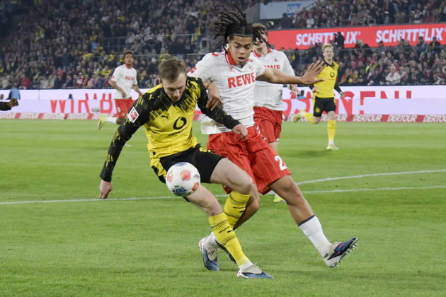 from left in duel Maximilian Beier Dortmund 14 Jahmai Simpson Pusey Koeln 22 07 03 2026¢ Football ¢ 1 FC Koeln vs Borussia Dortmund , Rheinenergiestadion, Koeln, DFB DFL REGULATIONS PROHIBIT ANY USE OF PHOTOGRAPHS AS IMAGE SEQUENCES AND OR QUASI VIDEO Copyright: xpepphotox xHorstxMauelshagenx pep00321, pep_20260307_hm_300908