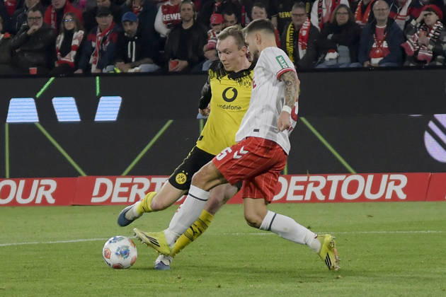 from left in duel Maximilian Beier Dortmund 14 Tom Krauß Krauss Koeln 5 07 03 2026¢ Soccer ¢ 1 FC Koeln vs Borussia Dortmund , Rheinenergiestadion, Koeln, DFB DFL REGULATIONS PROHIBIT ANY USE OF PHOTOGRAPHS AS IMAGE SEQUENCES AND OR QUASI VIDEO Copyright: xpepphotox xHorstxMauelshagenx pep00321, pep_20260307_hm_300933