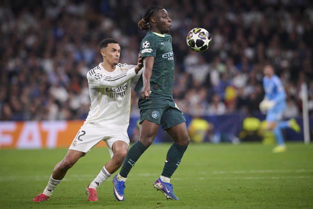Real Madrid CF s Trent Alexander-Arnold (l) and Manchester City FC s Jeremy Doku during Champions League 2025 2026 match. March 11,2026. (20260311079)