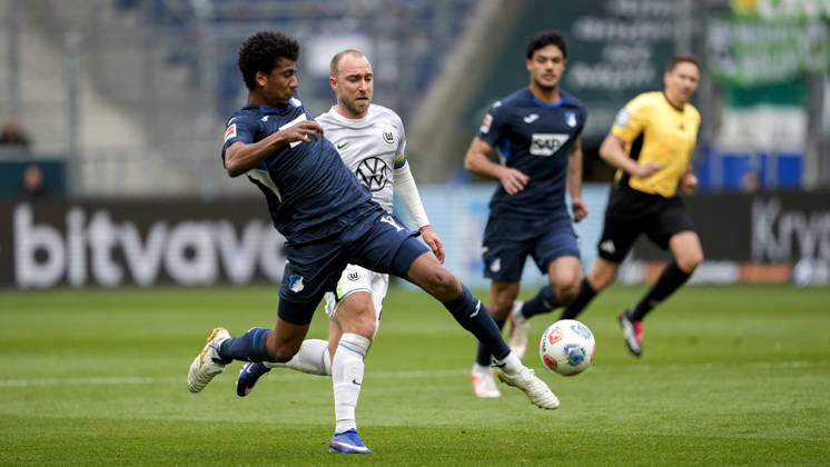 v li Bernardo Fernandes da Silva Junior Hoffenheim, 13 , Christian Eriksen Wolfsburg, 24 , duel, duel scene, duel, tackle, tackling, dynamics, action, 14 03 2026, Sinsheim Germany , Football, Bundesliga, TSG 1899 Hoffenheim VfL Wolfsburg, DFB DFL REGULATIONS PROHIBIT ANY USE OF PHOTOGRAPHS AS IMAGE SEQUENCES AND OR QUASI VIDEO xozx