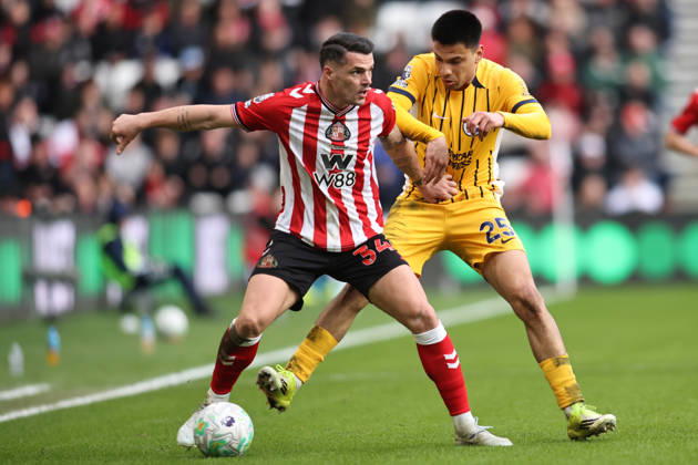 Sunderland v Brighton & Hove Albion - Premier League Granit Xhaka of Sunderland is challenged by Diego Gomez of Brighton and Hove Albion during the Premier League match between Sunderland and Brighton and Hove Albion at the Stadium of Light in Sunderland, United Kingdom, on March 14, 2026. Sunderland Tyne and Wear United Kingdom Copyright: xMIxNewsx originalFilename:fletcher-sunderla260314_npgsp