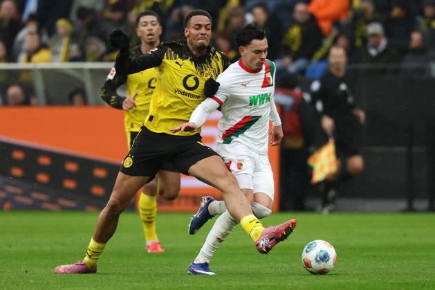 Dortmund, Germany, 14 03 26, Felix Nmecha Borussia Dortmund and Fabian Rieder FC Augsburg in a duel during the match of the 1 Bundesliga between Borussia Dortmund FC Augsburg at the Signal Iduna Park in Dortmund Photo by Joachim Bywaletz DFB DFL REGULATIONS PROHIBIT ANY USE OF PHOTOGRAPHS AS IMAGE SEQUENCES AND OR QUASI VIDEO Copyright: JoachimxBywaletz xJB-Sportfoto