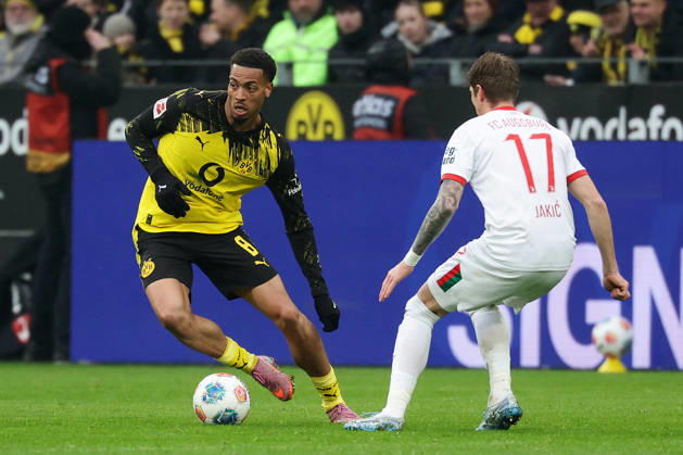 Dortmund, Germany, 14 03 26, Felix Nmecha Borussia Dortmund and Kristijan Jakic FC Augsburg in a duel during the match of the 1 Bundesliga between Borussia Dortmund FC Augsburg at the Signal Iduna Park in Dortmund Photo by Joachim Bywaletz DFB DFL REGULATIONS PROHIBIT ANY USE OF PHOTOGRAPHS AS IMAGE SEQUENCES AND OR QUASI VIDEO Copyright: JoachimxBywaletz xJB-Sportfoto