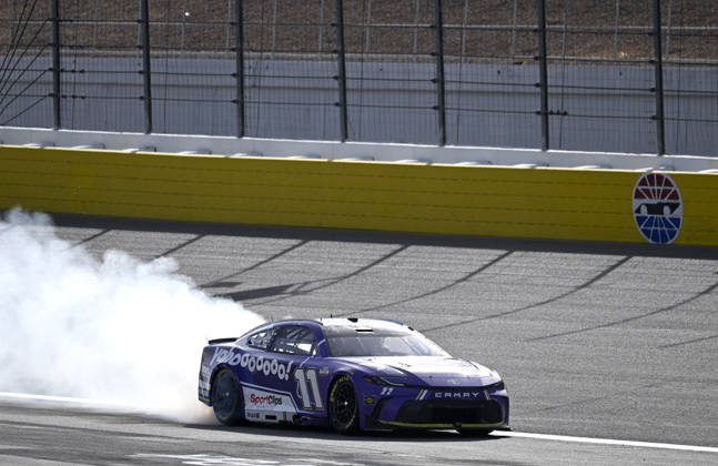 LAS VEGAS, NV - MARCH 15: Denny Hamlin ( 11 Joe Gibbs Racing Yahoo! Toyota) celebrates with a burnout down the front straight after winning the NASCAR, Motorsport, USA Cup Series Pennzoil 400 on March 15, 2026, at Las Vegas Motor Speedway in Las Vegas, NV. (Photo by Will Lester Icon Sportswire) AUTO: MAR 15 NASCAR Cup Series Pennzoil 400 EDITORIAL USE ONLY Icon24031515329