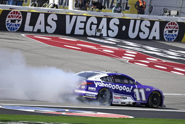 LAS VEGAS, NV - MARCH 15: Denny Hamlin ( 11 Joe Gibbs Racing Yahoo! Toyota) celebrates with a burnout down the front straight after winning the NASCAR, Motorsport, USA Cup Series Pennzoil 400 on March 15, 2026, at Las Vegas Motor Speedway in Las Vegas, NV. (Photo by Will Lester Icon Sportswire) AUTO: MAR 15 NASCAR Cup Series Pennzoil 400 EDITORIAL USE ONLY Icon24031515677