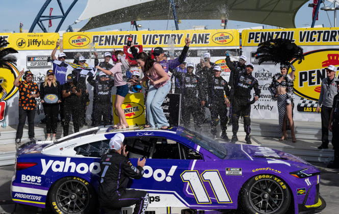 LAS VEGAS, NV - MARCH 15: Denny Hamlin ( 11 Joe Gibbs Racing Yahoo! Toyota) celebrates in victory lane as his daughters stand on the car after winning the NASCAR, Motorsport, USA Cup Series Pennzoil 400 on March 15, 2026, at Las Vegas Motor Speedway in Las Vegas, NV. (Photo by Will Lester Icon Sportswire) AUTO: MAR 15 NASCAR Cup Series Pennzoil 400 EDITORIAL USE ONLY Icon240315158481